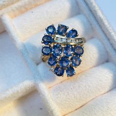 Featuring a glittering cluster of periwinkle blue natural oval sapphires set in a solid 14K yellow gold cluster. The ring is 22mm wide with a rise of 15mm, and a 2mm shank Marked 14K 5.7g Periwinkle Blue, Natural Blue Sapphire, Cluster Ring, Stackable Rings, Color Azul, Blue Sapphire, Jewelry Rings, Sapphire, Etsy Accessories