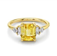 "3.0CT Yellow Sapphire Emerald Cut Engagement Ring,Minimalist Style Anniversary Ring,Sapphire Ring, Diamond Promise Ring,14K Yellow Gold Ring Antique Ring collection including gemstones.\" Forever. And ever.\" you will find your new Ring. ♠ Stone Details ➵ 3.0 CT Approx. Total (10.0×8.0 mm) ➵ Sapphire: Yellow Emerald Cut ➵ Side Stone: Round Cut 0.15ctw & 0.14ctw Baguette Simulated Diamond ➵ Main Stone Color: (Yellow) ➵ Stone Clarity: VVS ➵ Stone Luster: Excellent ➵ Stone Make: High Quality ➵ Cen Sapphire Emerald Cut Engagement Ring, Nontraditional Engagement Rings, Emerald Cut Engagement Ring, Yellow Sapphire Rings, Emerald Cut Engagement, Minimalist Engagement Ring, Ring Sapphire, Emerald Cut Rings, Diamond Promise Rings