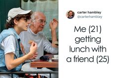 an older man and young woman sitting at a table with food in front of them