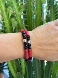 "Opaque Black and Dark Red Beaded Stretch Bracelet with Heart Charm - Set of Two Bracelets Crystal string stretch bracelet with silver colored metal heart charm and opaque black Czech glass and dark red clay beads.  Fits 6 1/2\" wrist." Casual Black Heart-shaped Bracelets, Casual Black Heart-shaped Bracelet, Black Heart-shaped Adjustable Beaded Bracelets, Casual Black Jewelry With Heart Beads, Black Beaded Bracelets With Heart Beads For Friendship, Casual Red Beaded Bracelets With Black Beads, Black Heart-shaped Jewelry With Letter Beads, Bracelets Crystal, Bracelet With Heart