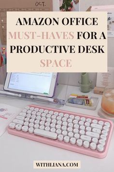 a pink keyboard sitting on top of a white desk