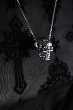 "☆☆Welcome to the Submit and Obey☆☆ 3 Dimensional Stainless Steel skull pendant necklace a solid statement piece comes on a 24\" chain hollow underneath. Introducing our Gothic Stainless Steel Skull Necklace, the perfect accessory to add an edgy and stylish touch to any outfit. Crafted with meticulous attention to detail, this 3D pendant showcases a beautifully crafted silver skull suspended from a durable stainless steel chain. Designed to appeal to both men and women, this versatile necklace i Silver Punk Pendant Necklace, Silver Gothic Box Chain Jewelry, Silver Punk Skull Necklace, Gothic Silver Box Chain Necklace, Silver Gothic Skull Necklace, Punk Silver Engraved Jewelry, Punk Style Engraved Silver Jewelry, Silver Biker Jewelry For Streetwear, Silver Skull Chain Necklace