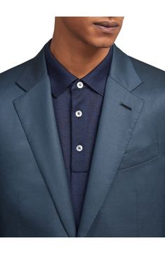 Incredibly high-thread-count wool—named for the Italian word for 120,000—lends a luxurious feel to this impeccable suit. Precise pickstitching showcases the label's scrupulous attention to detail. Jacket has notched lapels, split cuffs, chest welt pocket, front flap pockets, side vents Pants have zip fly; front slant pockets; back button-welt pockets Lined 100% wool Dry clean Made in Italy Men's Designer Clothing Luxury Tailored Long Sleeve Suit, Luxury Tailored Suit, Designer Suits With Hidden Button Closure, Luxury Single-button Sets With Notch Lapel, Designer Tailored Suits With Suit Collar, Designer Single Button Suit For Semi-formal Occasions, Designer Single Breasted Wool Suit, Designer Single Breasted Formal Suits, Luxury Long Sleeve Suits In Suiting Fabric