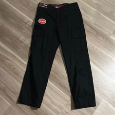 Never Been Worn, Black, Great Condition Black Fitted Work Pants With Pockets, Fitted Black Work Pants With Pockets, Black Full-length Work Pants With Side Pockets, Black Full Length Work Pants With Side Pockets, Black Tapered Leg Cargo Work Pants, Black Straight Leg Work Pants With Cargo Pockets, Black Tapered Leg Work Pants With Cargo Pockets, Fitted Black Cargo Work Pants, Black Straight Leg Work Pants With Pockets