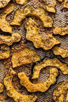 baked zucchini chips on a baking sheet