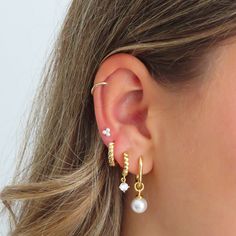 Add some bliss to your outfit with these unique Bliss Earrings. Featuring a playful bubble and dot design, these earrings are sure to make a statement. The drop down stone adds a touch of elegance, making these earrings the perfect combination of fun and sophistication. Piercing Styles, Brynn Rumfallo, Evry Jewels, Bubble Earrings, Pretty Ear Piercings, Jeweled Earrings, Ear Candy, Earrings Pearl, Ear Piercing