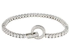 Bella Luce® white diamond simulant 6.64ctw round platinum over sterling silver "More Than A Circle" bracelet. Measures approximately 7.25"L x 0.13"w with fold over clasp. The diamond equivalent weight is 4.02ctw. Circle Bracelet, Diamond Simulant, A Circle, Sterling Silver Bracelet, Fold Over, White Diamond, Sterling Silver Bracelets, Diamond Bracelet, Cubic Zirconia