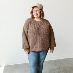 Meet the chunky knit sweater. Made of 100% super-soft organic cotton knit, it is the perfect sweater for the season of cozy. Features ribbed cuffs at the wrist and a comfy drop sleeve shoulder. Wear it oversized with the front tucked or size down for a more fitted look. This will be your go to sweater all season long! Fabric: 100% organic cotton chunky knit Everyday Chunky Knit Sweater, Oversized Ribbed Brown Sweater, Oversized Brown Ribbed Sweater, Everyday Brown Sweater With Ribbed Cuffs, Brown Sweater With Ribbed Cuffs For Everyday, Oversized Brown Sweater With Ribbed Cuffs, Brown Textured Knit Relaxed Fit Sweater, Everyday Soft Knit Brown Sweater, Cozy Ribbed Brown Sweater