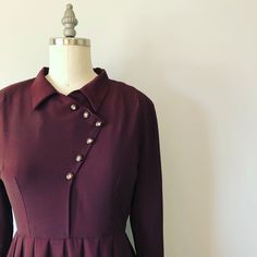 "A lovely long sleeve petite handmade dress in a maroonish brown colour. A metal zipper runs down the left side of the dress. I think this piece would look fantastic paired with a hat! Size: S (petite) Tag - none Era - 40s Material - rayon, metal zipper Bust - 32 to 34\" Waist - 26/26.5\" Hips - 35 to 37\" Arm length - 17.5\" Length - 39.5\" Cleaning - dry clean or lightly steam clean" Classic Vintage Dress For Fall Workwear, Classic Vintage Dress For Work In Fall, Classic Fall Vintage Dress For Workwear, Long Sleeve Vintage Dress For Formal Fall Events, Formal Vintage Long Sleeve Dress For Fall, Formal Long Sleeve Vintage Dress For Fall, Classic Long Sleeve Vintage Evening Dress, Classic Long Sleeve Evening Vintage Dress, Classic Long Sleeve Brown Dress