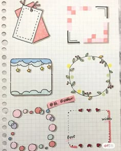 an open notebook with paper cut outs and stickers on the pages, including tags