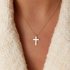 This 14k plain gold dangling cross necklace is a simple yet stunning accessory that will add a touch of sophistication to any outfit. The delicate gold chain holds a beautifully crafted cross charm that dances elegantly with every movement. Measuring approximately 18mm in size, this necklace is the perfect size for everyday wear, and the 14k gold construction ensures that it will last for years to come. ▶  Features * Made to Order. * Gold KT: 14K Solid Gold * Custom Gold Color: Rose Gold, Yellow Gold, White Gold * Cross: 18 x 11 MM * Ready to Ship in 3-5 Business Days ▶ See more of our Gold Necklaces here - http://etsy.me/2lUxj86 ▶ See our storefront here - http://etsy.me/2lUcVnH  ▶ All store sections here * Diamond Rings - http://etsy.me/2lwKUl8 * Diamond Earrings - http://etsy.me/2lyqVBP Minimalist Yellow Gold Cross Necklace With Clavicle Chain, Minimalist 14k Gold Cross Pendant Necklace, Everyday 14k Gold Cross Pendant Necklace, Everyday 14k Gold Cross Necklace, Daily 14k Gold Cross Pendant Necklace, Everyday 14k Yellow Gold Cross Necklace, Minimalist Yellow Gold Cross Necklace, Minimalist Yellow Gold Cross Pendant Necklace, Minimalist 14k Gold Crucifix Jewelry