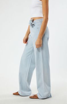 PacSun denim is back with a classic this season — the Light Indigo Rose Belted Low Rise Baggy Jeans! These super cute jeans sit low on the waist and feature an ultra-slouchy relaxed leg, a rose belted waist detail, and a light indigo wash. High Rise Denim Blue Flare Jeans For Summer, High Rise Flare Jeans In Denim Blue For Summer, Mid-rise Denim Blue Flare Jeans For Summer, Relaxed Fit Flare Jeans For Summer Day Out, Summer Relaxed Fit Flare Jeans For Day Out, Washed Blue Cotton Jeans For Spring, Spring Cotton Denim Blue Flare Jeans, Trendy Washed Blue Flare Jeans For Spring, Spring Denim Blue Cotton Flare Jeans