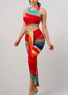 Featuring a crop top and flattering pencil skirt, this set is one party-ready standout. Top Round Neckline Crop Sleeveless Racer Back Stretchy Fabric: 95% Poly / 5% Spandex Skirt High Waist Elastic Waistband Front Drape Stretchy Length: 37" Approx. Fabric: 95% Poly / 5% Spandex Sleeveless Multicolor Two-piece Set, Multicolor Sleeveless Two-piece Set, Fitted Two-piece Crop Top For Summer, Fitted Multicolor Sleeveless Crop Top, Fitted Multicolor Crop Top, Sleeveless Summer Club Sets, Stretch Sets For Night Out In Summer, Stretch Sets For Summer Night Out, Trendy Summer Club Sets