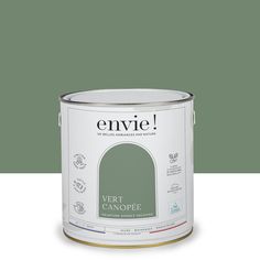 a can of green paint with the words envie painted on it's side