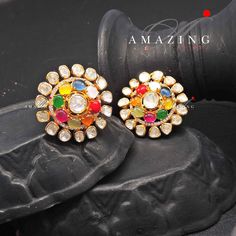 Navratna Stone Earring |Semi Precious Navaratna Earring | Moissanite Polki Earring | Indian Wedding Jewelry | Stud | Earring Material: Silver Gemstone: Moissanite, Semi Precious Navratna Stones  Stone colour:  Uncut Polki Primary colour: Gold Size-Length: 28mm Width: 28mm Closure: Screw back and Clips Silver Intricate, hand-crafted, Pure Silver Polki Earrings, studded with high-quality Semi Precious Navratna Stones, Earring comes with a screw back and clips, made in 92.5 silver with 22ct gold pl Festive Gemstone Earrings For Wedding, Gemstone Earrings For Wedding And Festivals, Fusion Style Meenakari Bridal Earrings For Reception, Traditional Multicolor Earrings For Formal Occasions, Traditional Multicolor Hallmarked Earrings, Festive Bridal Earrings With Gemstones, Traditional Multicolor Formal Earrings, Celebration Gemstone Chandbali Bridal Earrings, Fusion Style Multi-stone Chandbali Earrings