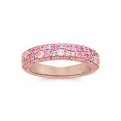 This beautiful ring features a monochromatic mosaic of natural pink sapphires dotted with natural diamond accents to create a bold pop of color. Its vivid 14-karat rose gold perfectly complements all the gemstones. Pink Jewerly, Sapphire Ring Engagement, Pink Sapphire Diamond Ring, Pink Diamond Engagement Ring, Dream Rings, Colorful Gemstones, Pink Sapphire Ring Engagement, Pink Pilates, Expensive Jewelry Luxury