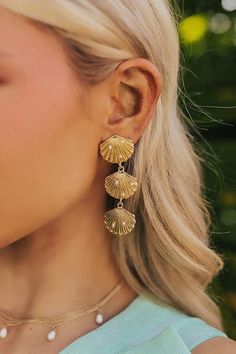 Go for a stylish beachy vibe with these chic earrings! - Gold colored material with faux pearl accents - A seashell stud with dangling seashells design - Post and backs - Length: 2.6 inches Chic Earrings, Fairytale Dress, Jean Accessories, Holiday Trends, Denim Trends, Midi Dress Party, Shell Earrings, Lace Fashion, Sock Shoes