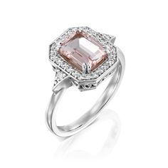 The Katerina ring is our show-stopping piece and has a large, pink Morganite stone in the center. Adorning the stone are 26 sparkling diamonds creating a halo effect around the stone. It’s a ring inspired by royalty and it's absolutely glamorous. **Due to the nature of the stone the color of the center stone may vary** All features can be customized! please contact us if you wish to make changes, we love making custom designs. All of our jewelry is carefully handmade in our atelier *HC diamond a Timeless Morganite Ring With Center Stone, Pink Diamond Ring With Halo Setting For Formal Occasions, Pink Diamond Ring With Halo Setting For Formal Events, Classic Pink Cluster Ring For Formal Occasions, Pink Halo Ring With Prong Setting For Formal Occasions, Formal Pink Halo Ring With Prong Setting, Morganite Diamond Ring With Accent Stones, Classic Morganite Diamond Ring With Center Stone, Pink Diamond Halo Ring With Center Stone