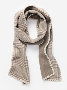 A reversible scarf in a cozy wool blend, the Valais matches perfectly with our Frade Coat in Glen Plaid (though we recommend wearing it with everything else, too). | J.McLaughlin Women's Valais Scarf in Glen Plaid Off White/Gray | Nylon/Wool Beige Wool Scarves For Winter, Casual Cashmere Scarves For Fall, Cozy Wool Scarves For Fall, Casual Merino Wool Scarves For Fall, Casual Cashmere Scarf For Winter, Casual Wool Scarves For Fall, One Size Wool Scarves For Winter, Cozy Fall Scarves For Layering, Cream Wool Scarf For Fall