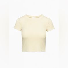 Nwot Wilfred Free By Aritzia Go-To T-Shirt In The Color Gd Pear Sorbet, A Creamy Light Yellow Color The One You Go To, And Go To, And Go To... This Is A Crewneck T-Shirt Designed For A Tight Fit. It’s Cut From Soft And Stretchy Ribbed Fabric Made With Tencel Modal Responsibly Sourced Wood-Based Fibres Produced Through A Process That Reduces Impact On Forests, Biodiversity And Water Supply. Fit: Tight A Close Fit That Hugs The Body Length: Waist Intended To Hit Between The Waist And High Hip Mate Yellow Cotton Short Sleeve Crop Top, Yellow Fitted Crew Neck Top, Yellow Cotton Crop Top With Short Sleeves, Yellow Short Sleeve Tops For Summer, Fitted Yellow T-shirt For Summer, Fitted Yellow Summer T-shirt, Trendy Yellow Crew Neck Crop Top, Yellow Relaxed Fit Short Sleeve Tops, Yellow Cotton Crew Neck Top