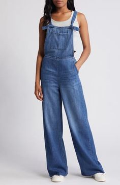 Raw hems and light fading give lived-in appeal to these laid-back overalls cut with a relaxed, straight-leg fit. 29" inseam Square neck Adjustable buckle straps 73% cotton, 27% rayon Machine wash, tumble dry Imported Everyday Medium Wash Relaxed Fit Denim Jumpsuit, Relaxed Fit Medium Wash Denim Jumpsuit For Everyday, Everyday Relaxed Fit Medium Wash Denim Jumpsuit, Medium Wash Full Length Overalls For Spring, Full-length Medium Wash Overalls For Spring, Casual Full-length Relaxed Fit Overalls, Full Length Medium Wash Overalls For Spring, Casual Full Length Relaxed Fit Overalls, Casual Medium Wash Full-length Overalls