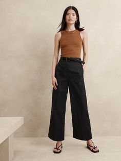 We designed these cropped wide-leg pants with warm weather in mind, cutting them from a softly structured twill made from breathable cotton and silky modal.  We added an adjustable slider belt, trouser creases and a wide-hem detail for a utilitarian twist.  High rise (11. 25"), wide leg.  Cropped length.  Zip fly with hook-and-bar closure.  Slider belt with snap closure.  Front and back pockets.  Unlined.  High rise (11. 25"), wide leg.  Cropped length.  Inseams: Petite/Short 23. 5", Regular 25. Cropped Wide Leg Pants Outfit, Wide Leg Trousers Outfit, Linen Pants Outfit, Wide Leg Pants Outfit, Cropped Wide Leg Pants, Corporate Outfits, Black Wide Leg Pants, Wide Leg Cropped Pants, Casual Work Outfits