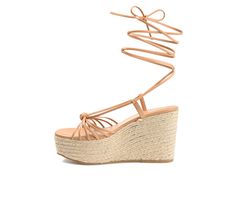 With the Catalinn by Journee Collection, you can bring on the summer vibes. The multi-straps on this tie-up shoe are guaranteed to brighten up your day. Soft vegan leather uppers, a 4 mm Tru Comfort Foam™ footbed, and an espadrille-wrapped platform heel add texture to the design. Luxe Vegan Leather upper, Dainty ankle wrap tie-up design, Approx. 4\ espadrille wrapped platform / wedge, Open Soft Square toe, Tru Comfort Foam™ footbed, Man-made outsole, Caged multi-strap design with knotted detail Summer Synthetic Strappy Lace-up Sandals, Strapped Lace-up Sandals For Beach In Summer, Summer Vacation Lace-up Sandals With Heel Strap, Strapped Lace-up Sandals For Summer Beach, Summer Lace-up Sandals With Strap And Round Toe, Spring Strapped Sandals With Wrapped Heel, Trendy Lace-up Sandals With Heel Strap For Beach, Synthetic Ankle Tie Lace-up Sandals For Summer, Adjustable Strappy Heels For Vacation