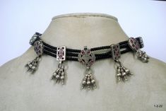 vintage antique tribal old silver choker necklace from rajasthan india, great design old silver pendants re-strung in traditionaly way with black beads. Collectible item. Best gift item. Note - Please check pictures carefully for more details. Length - Free size can be adjust by back thread knot. Gross weight - 39 grams Material - Silver and original old worn piece. Traditional Black Beaded Jewelry For Festivals, Traditional Black Beaded Necklaces For Festive Occasions, Traditional Black Beaded Necklace For Festive Occasions, Traditional Black Beaded Necklaces, Traditional Black Beaded Jewelry, Black Bohemian Necklace For Ceremonial Occasion, Bohemian Black Beaded Necklaces For Festivals, Bohemian Black Beaded Necklace For Festivals, Bohemian Silver Necklace With Black Beads