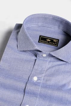 Whether you're dressing for a formal event or a stylish night out, this shirt's regular fit ensures you look and feel your best, exuding confidence and charm. Now get the best of comfort and fashion in one place. The sophistication and style of our Yonder Blue Dobby Textured Premium Giza Cotton Cutaway Collar Shirt captures attention wherever you go. Fused collar and cuffs, collar stand and flat felled side seams provide structure and stability to all our shirts. 100 % Premium Giza Cotton: Long Luxury Washed Blue Casual Shirt, Blue Luxury Classic T-shirt, Luxury Blue Cotton Shirt, Luxury Washed Blue Men's Shirt, Blue Technical Moisture-wicking T-shirt, Dobby Weave, Cutaway Collar, Suede Chelsea Boots, Acid Wash Denim