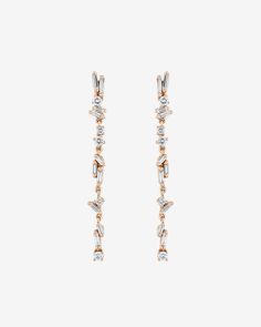 Crafted in 18-karat gold, these exquisite drop earrings are the perfect blend of elegance and sparkle. Set with a mix of round and baguette diamonds in our timeless 'Fireworks' design. Details 18k yellow gold, rose gold or white gold 0.42 carats of baguette and round white diamonds 1.5" inches length Ref: BAE426 Fireworks Design, Baguette Diamonds, Outfit Making, Diamond Drop Earrings, Diamond Drops, Baguette Diamond, Rose Gold Earrings, White Diamonds, Gold Rose