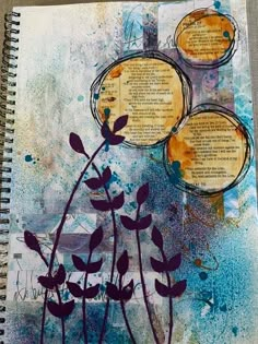 an art journal with flowers and words on it