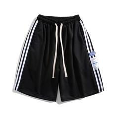 These Street Stripe Label Shorts feature a unique and stylish design. Perfect for any casual or semi-formal occasion, the shorts offer comfort and convenience with their elastic waistband. Crafted in a lightweight fabric, these shorts have a classic design with subtle side pockets. Features: -100% Polyester -Mid-rise Waist -Straight Leg -Adjustable Waistband -Regular Fit -Street Style Leisure Knee-length Bottoms With Built-in Shorts, Spring Streetwear Shorts With Drawstring, Spring Bermuda Athletic Shorts With Built-in Shorts, Summer Streetwear Knee-length Bottoms, Sporty Side Stripes Shorts For Summer, Summer Leisure Shorts With Short Inseam, Sporty Summer Shorts With Side Stripes, Bermuda Bottoms For Spring Leisure, Leisure Summer Shorts With Short Inseam