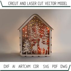 the laser cut paper house is decorated with christmas lights