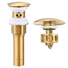 an image of a gold and white bathroom sink faucet with the top off