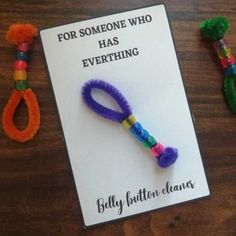 a card that says for someone who has everything on it with some beads attached to it