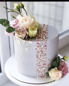 there is a cake with flowers on it