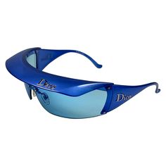 a pair of blue sunglasses with the word dolce on it