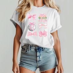 Introducing our pink coquette bow shirt! This shirt features a pink coquette design inspired by strong girls and women. This makes the perfect shirt for back to school, teacher appreciation gift, and girl moms. This shirt celebrates the power of girls and women! This is a MUST HAVE for your collection. 💖 I T E M * I N F O ✦ Bella+Canvas 3001 Unisex Shirt. ✦  Made with 100% Airlume combed and ring-spun cotton, a lightweight fabric (142 gsm). Heather colors contain Polyester. ✦  Printed using Direct To Garment style- Inks are printed directly into the fabric. ✦ Different sizing may effect placement of final design. ✦ Colors may differ slightly due to different user monitor and screen settings. ✦ Rolled Sleeves in pictures is for styling purposes only. ✦ Props used In photos are NOT included Cute Pink T-shirt With Bow, Cute Pink Short Sleeve Shirt, Feminine Pink Short Sleeve Shirt, Cute White Top With Pink Bow, Cute Short Sleeve Tops With Bow, White Bow Print Short Sleeve Top, Spring Feminine Tops With Pink Bow, Casual Crew Neck Top With Pink Bow, White Cotton Top With Pink Bow