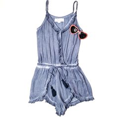 Darling Vintage Havana Blue Denim Look Spaghetti Strap Shorts Romper With Spaghetti Straps. Never Worn! V-Neck With Ruffles. Ruffles Continue Down The Torso And Are Featured On The Shorts And Short Bottoms. Drawstring Tie At Waist With Navy Blue Tassel Ends. Has Stylish Distressed Print. So Soft And Comfy For Spring Through Fall Outings Or For Everyday! Great For Beach, Day Or Nights Out, Summer Parties. 100% Rayon. Great Condition - See Photos. Size Medium Measurements Laying Flat. See Measurem Summer Washed Blue Fitted Jumpsuits And Rompers, Fitted Washed Blue Jumpsuits And Rompers For Summer, Blue Spaghetti Strap Jumpsuits And Rompers For Summer, Denim Blue Jumpsuits And Rompers For Summer Day Out, Casual Blue Jumpsuits And Rompers With Spaghetti Straps, Casual Blue Jumpsuits With Spaghetti Straps, Trendy Washed Blue Jumpsuits And Rompers For Summer, Blue Overall Beach Bottoms, Summer Washed Blue Cotton Jumpsuits And Rompers