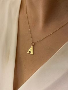 "ABOUT PRODUCT This 14K Solid Gold Initial Pendant necklace is beautifully designed and hand crafted with our associates to make this a special gift for your loved ones. Knowing the value of our customers, We prepare each piece with extra care and attention. ITEM DETAILS Material: 14K Gold Approx: 1.80 gram Available colors: Gold, Rose Gold, White Gold Available Sizes: 14\" to 20\" ✪ 14k Solid Gold ( Certification will be included with your order ) ✪Available 14K White, Yellow, Rose Gold (also i Handmade Yellow Gold Name Necklace Pendant, Handmade Yellow Gold Pendant Name Necklace, Modern Initial Pendant Necklace As Gift, 14k Gold Initial Pendant Necklace As Gift For Her, Modern Yellow Gold Initial Pendant Necklace, Everyday Heart Pendant Necklace With Initials, Modern Initial Pendant Necklace For Anniversary, Modern Initial Pendant Jewelry For Gifts, Modern Initial Pendant Jewelry Gift