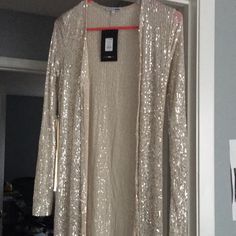 Fashion Nova True Glam Sequin Cardigan, Size S (This Was Part Of A 3 Piece Set, But Only Selling The Sequin Cardigan) Brand New Chic Sequined Cardigan, Chic Sequined Cardigan For Fall, Chic Long Sleeve Sequined Cardigan, Gold Cardigan For Winter Party, Gold Cardigan For Fall Party, Gold Cardigan For Spring Party, Gold Cardigan For Party In Spring, Gold Long Sleeve Cardigan For Spring, Elegant Sequined Cardigan For Spring