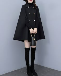 * A cool wool cape coat, very elegant. * With double breasted gold buttons, very beautiful. * If you want black buttons, please let us know, thanks. * Material: out shell - 50% wool, 50% polyester; lining - 100% polyester * Care: dry cleanable * Shop sizing chart FYI ( made according to US sizing. actual body figures, not laying flat clothes measurements) Size XS (US 2, UK 6, German 32, French 34, ) Bust: fits bust around 33.5 inches/85cm Waist: fits waist around 26 inches/66cm Hips: fits hips a Chic Winter Wool Cape Coat, Black Long Sleeve Outerwear With Gold Buttons, Black Double-breasted Wool Coat With Buttons, Elegant Winter Long Coat Cape, Elegant Long Coat Cape For Winter, Evening Long Coat With Buttons, Elegant Long Winter Cape, Elegant Cape-style Outerwear With Buttons, Elegant Black Outerwear With Gold Buttons