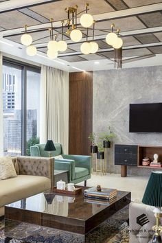 a living room filled with furniture and a flat screen tv