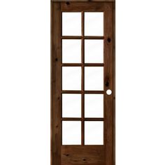 a wooden door with glass panels on the side