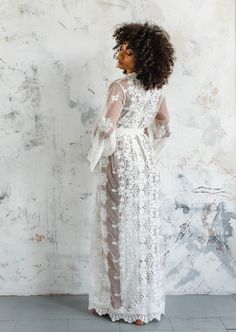 "We have a Size Small 47' Length and a Size 59\" Small Hayden ready to ship  An all over embroidered ivory lace kaftan, with a stunning scallop border all around. See our instagram @bibiluxe for more customer images. * Unlined kimono  * Ivory cotton embroidered tulle lace Other sizes and lengths available here  https://etsy.me/39Lo8Ex SMALL Fits Hips / Bust to up to 38\" FITS UK sizes 6-10 / Euro 34-38 / US 4-8  Actual garment measurements bust / hips 44\" (  when measuring for fit add an extra Fitted Lace Wedding Robe, Fitted Lace Robe For Wedding Night, Elegant Lace Bride's Robe, Elegant Lace Bridal Robe, Long Lace Robe For Wedding Night, Long Wedding Robe With Lace Trim, Elegant Lace Wedding Robe, Floor-length Lace Gown With Lace Trim, Delicate Lace Robe For Wedding Night