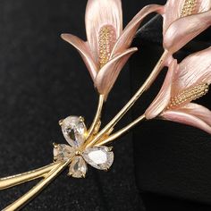 Indulge in a touch of opulence with our exquisite Copper Lily Elegant Enamel Floral Brooch. Handcrafted with precision, this piece boasts intricate floral design in delicate enamel, set on a luxurious copper base. Elevate any outfit with this elegant and sophisticated accessory. Tarnish-proof Water-proof Sleep / Nap-proof Safe for sensitive skin Wear it while working out &showering Designed to wear 24/7 If there is no stock, the product will take 15 days to produce Please leave your usual email Luxury Gold Enamel Brooches, Luxury Gold Enamel Brooch, Elegant Silver Enamel Pin, Luxury Gold Enamel Pin As Gift, Luxury Gold Enamel Pin For Gift, Luxury Gold Enamel Pin Gift, Gold Brooch With Flower Decoration For Formal Occasions, Gold Formal Enamel Pin, Elegant Pink Enamel Brooch Pin