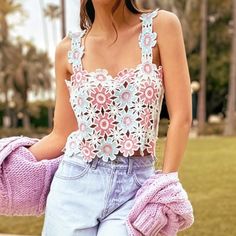 Give Your New Season Wardrobe The Upgrade It Deserves With This Multi Floral Crochet Crop Top. This Crop Top Is Brought To You In A Multi Floral Crochet Material With A Cropped Length, How Could You Resist This? This Crop Top Is Calling Your Name Doll. Just Add Denim Jeans, Sandals And Accessories To Complete The Look. Length Approx 33cm/13" (Based On A Sample Size Uk 8) Model Wears Size Uk 8/ Eu 36/ Aus 8/ Us 4 Model Height - 5ft 9.5" Length May Vary Due To Crochet Knit Print May Vary Trendy Crochet Lace Top For Summer, Trendy Crochet Top For Spring Vacation, Trendy Summer Crochet Top With Crochet Trim, Spring Lace Crochet Top, Trendy Crochet Top With Crochet Trim For Summer, Chic Spring Crop Top With Crochet Lace, Chic Spring Crochet Lace Crop Top, Chic Fitted Pink Crochet Top, Spring Crochet Top For Day Out