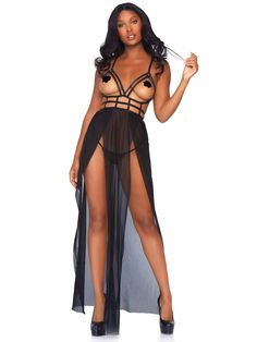 Entice them in this daring lingerie gown set by Leg Avenue, featuring a sexy sheer dress with cage strap bodice open cups, strappy bare back, dual slit sheer skirt, and matching thong panty. This hot lingerie dress can take you from the bedroom to poolside as a daring bikini coverup or add to your sex appeal by pairing this sheer lingerie look with thigh highs. Package includes: dress, panty Sexy lingerie set Stretchy, breathable mesh fabric Body-hugging see thru lingerie design Cage strap open Lingerie Gown, Spicy Lingerie, Sheer Maxi Dress, Hot Lingerie, Sheer Skirt, Leg Avenue, Lingerie Dress, Maxi Gowns, Business Dresses