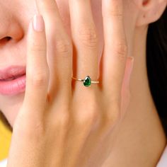 Here is Teardrop Emerald Ring Gold 14K for Mother. Our Pear Raindrop Cut Birthstone Ring Gold 10K is use as Tear Drop Green Gemstone Ring 18K for women. Single Stone Ring looks like mindful gift for her birthday. Teardrop emerald ring will be perfect gift shower on her birthday or anniversary night.  Emerald ring gold can be customized as her birthstone or birth month stone. We can turns it into a 14K emerald raindrop ring for her as a pear cut birthstone ring. Our tear drop gemstone ring and solitaire stack ring will be great and stunning birthday gifted symbolizes your love and serves as the ideal gift for your mummy, mama or mum. Please check our other birthstone rings: https://www.etsy.com/shop/minifinejewels?ref=seller-platform-mcnav§ion_id=40182033 Jewelry Details: Gold Type: 14K Car Yellow Gold Teardrop Ring For May Birthstone, Yellow Gold Teardrop May Birthstone Ring, Green Teardrop 14k Gold Ring, Teardrop Emerald Ring In Yellow Gold, Yellow Gold Teardrop Emerald Ring For Anniversary, Pear-shaped Birthstone Promise Ring, Teardrop Gemstone Ring In 14k Gold, Teardrop Emerald Promise Ring In Fine Jewelry Style, 14k Gold Teardrop Ring