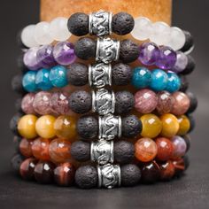 This Listing Is For Seven (7) Handmade Chakra Aromatherapy Bracelets That Are Made Of 8 Mm White Jade, Amethyst, Apatite, Strawberry Quartz, Blonde Tiger Eye, Fire Agate, Red Tiger Eye, And Lava Rock Beads, On Latex Free Elastic Cord. Pewter Focal Beads Finish Each Bracelet. Our Handmade, Aromatherapy Bracelets Combine The Healing Power Of Crystals With The Benefits Of Essential Oils And Aromatherapy. You Can Add A Drop Or Two Of Your Favorite Essential Oil, To The Lava Rock Beads, To Assist In Bringing Your Chakras Into Balance, Or Just To Enjoy The Fragrance All Day Long. Here Are The 7 Crystals And The Chakras They Balance: White Jade Crown Amethyst Third Eye Apatite Thro Chakra Aromatherapy, Benefits Of Essential Oils, Power Of Crystals, Crystal Reiki, Aromatherapy Bracelet, Aromatherapy Jewelry, Red Tiger, Red Tigers Eye, Bracelets Diy